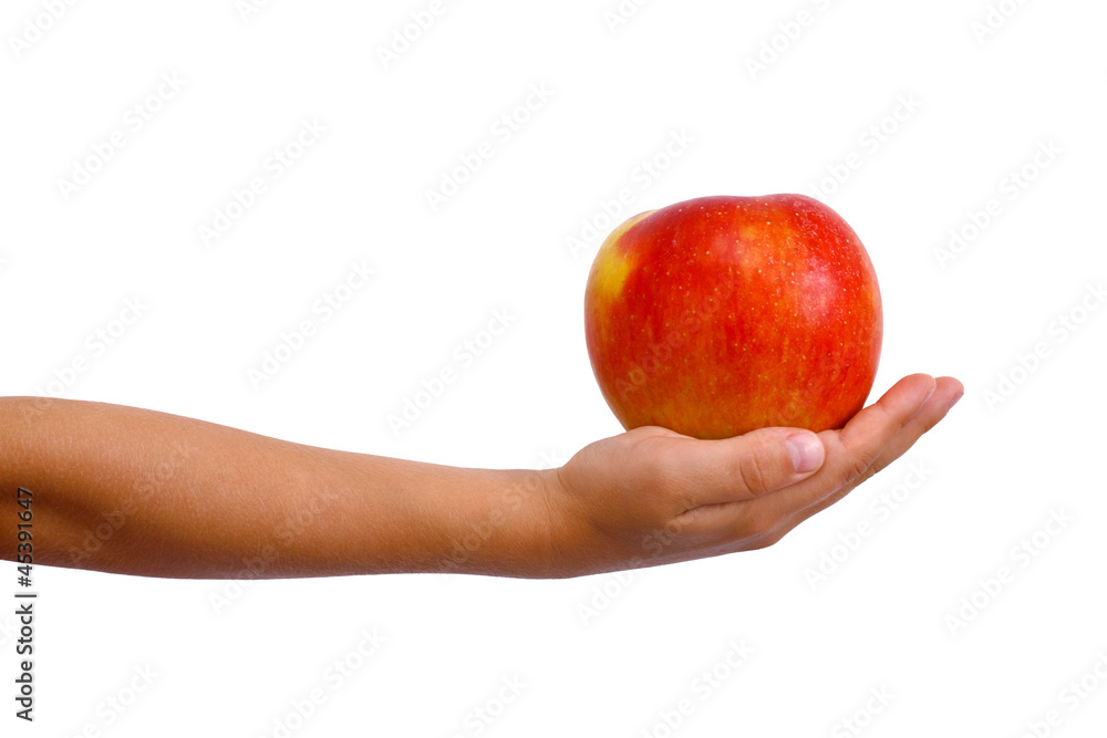 Young boys arm extended holding an red apple Young boys arm extended holding an red apple