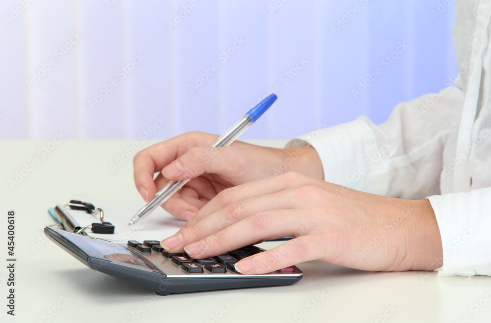 Fototapeta premium Closeup of businesswoman hands, writing on paper