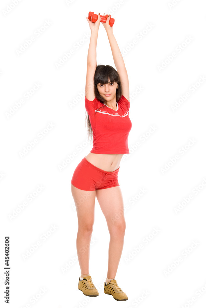 Attractive young woman doing exercises with dumbbells. Attractive young woman doing exercises with dumbbells.