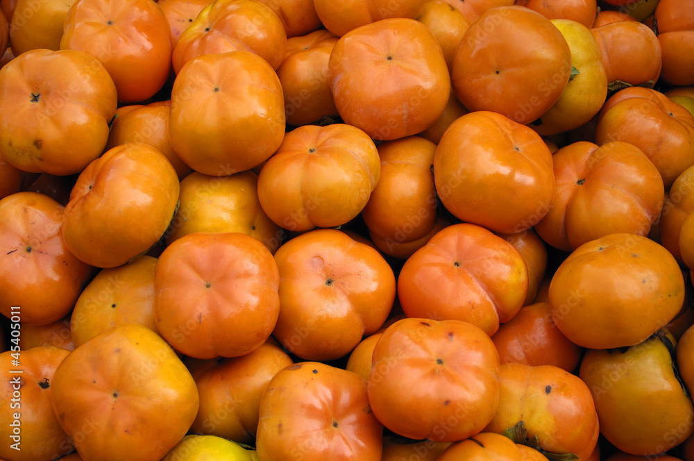 ripe persimmons background