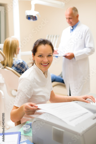 Dental assistant prepare patient personal document
