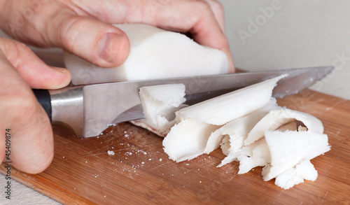 Bild auf Leinwand Salted white pork fat slicing