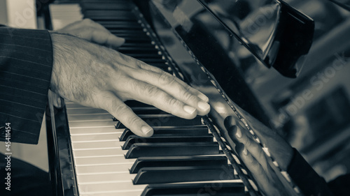 Detail of Hand playing Piano