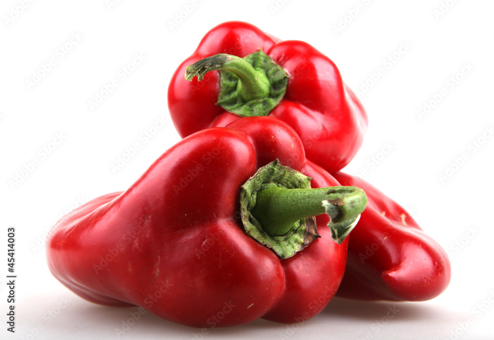 Red chilli peppers on white background. Red chilli peppers on white background.