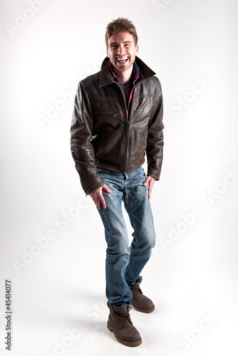 Portrait of young man laughing with leather jacket  © pio3