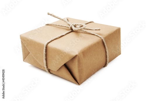 Parcel wrapped with brown paper and tied with string