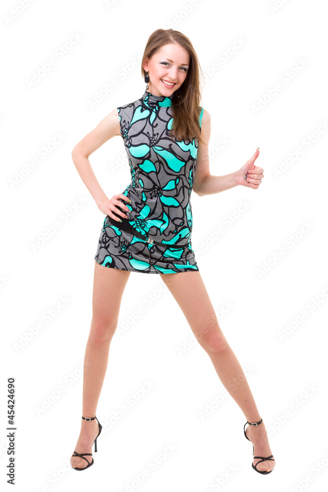 Fototapeta premium Smiling woman with thumbs up gesture posing