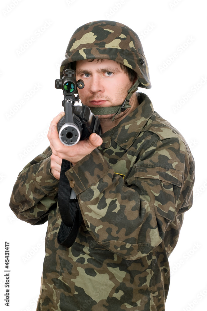 Soldier aiming a rifle. Closeup Soldier aiming a rifle. Closeup