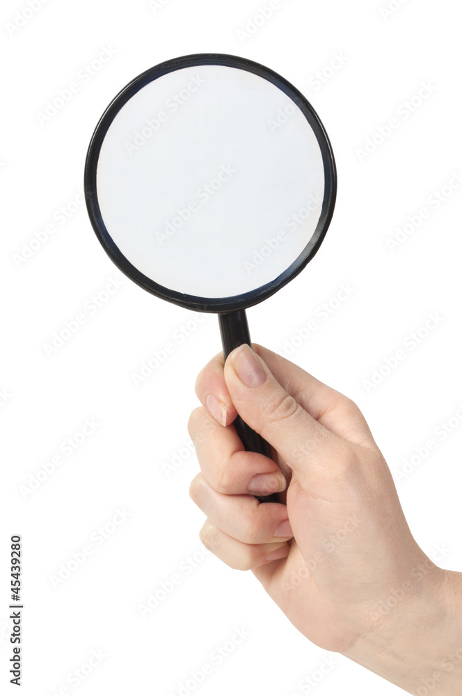 Magnifying glass in hand isolated on white background Magnifying glass in hand isolated on white background