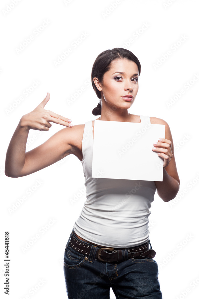 female in casual outfit holding and pointing on sign female in casual outfit holding and pointing on sign