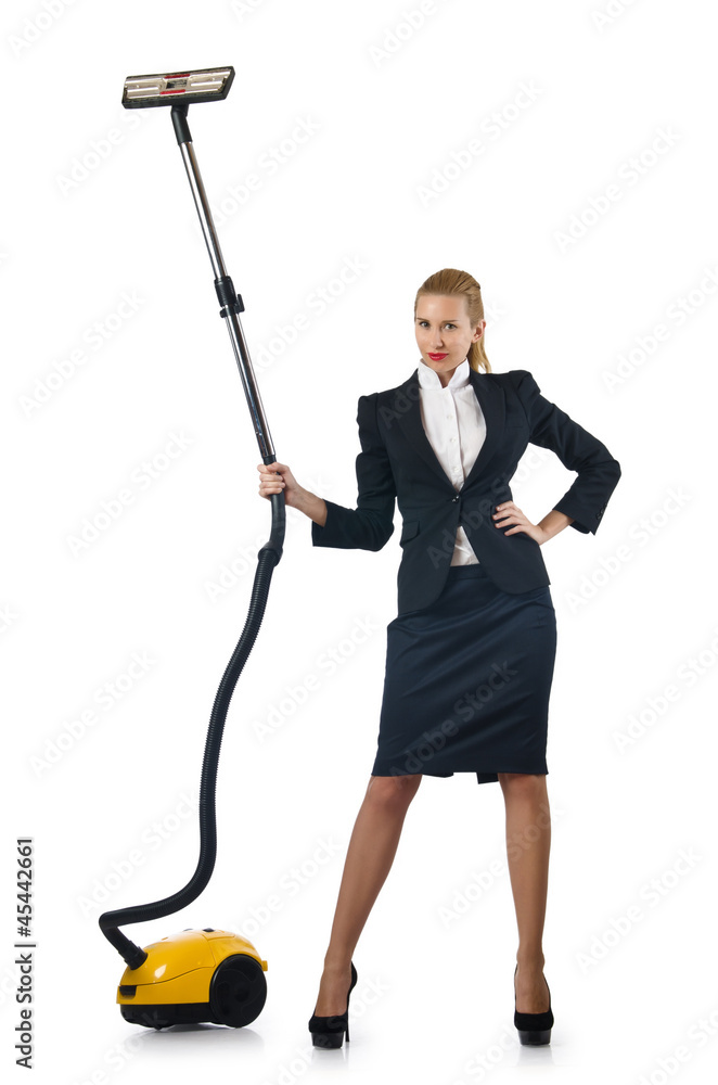 Businesswoman doing vacuum cleaning on white Businesswoman doing vacuum cleaning on white