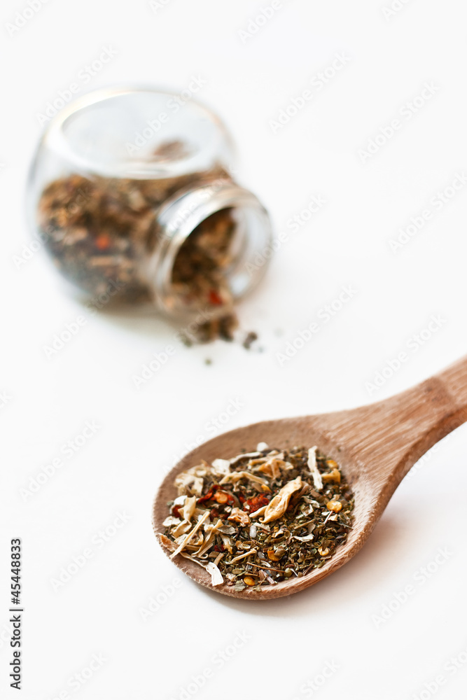 Mediterranean salad spices in oak spoon Mediterranean salad spices in oak spoon