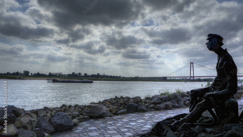 HDR Time lapse Poortekerls statue at the Rhein HDR Time lapse Poortekerls statue at the Rhein
