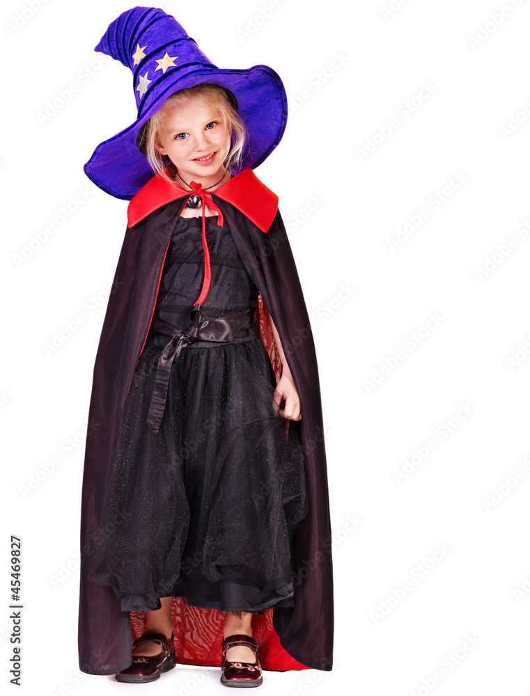Child wearing witch costume. Child wearing witch costume.
