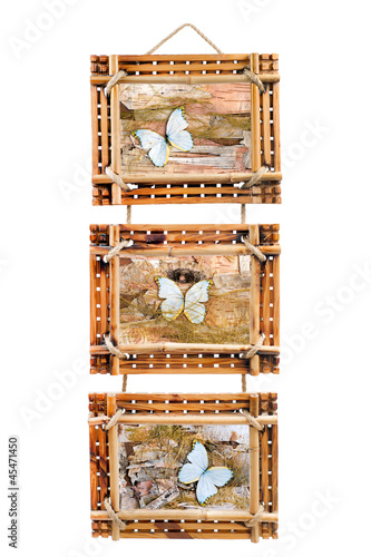 three bamboo photo frames with abstract composition of butterfli photo