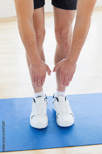 Man stretching to his toes