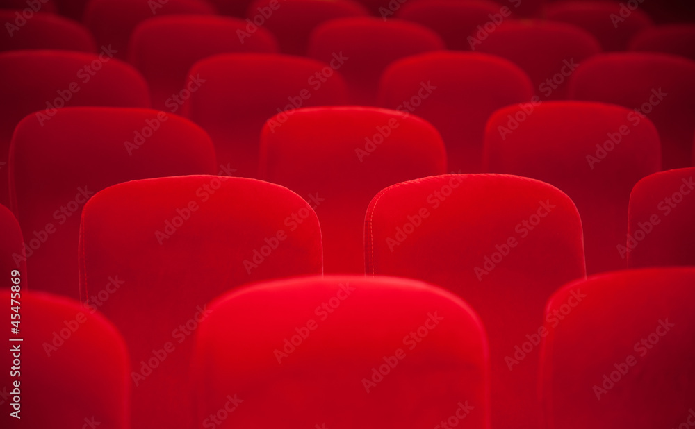 Obraz premium Red chairs in the empty auditorium