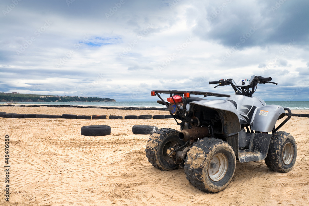 ATV bike on the sand beach