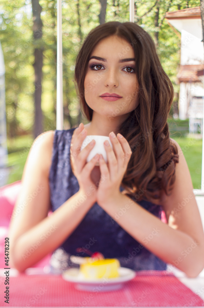 Portrait of a beautiful young woman on nature. Portrait of a beautiful young woman on nature.