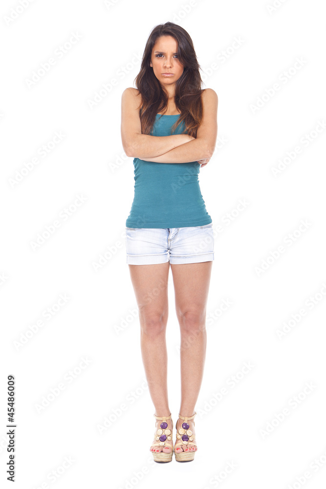 young woman looking angry and upset with arms crossed young woman looking angry and upset with arms crossed