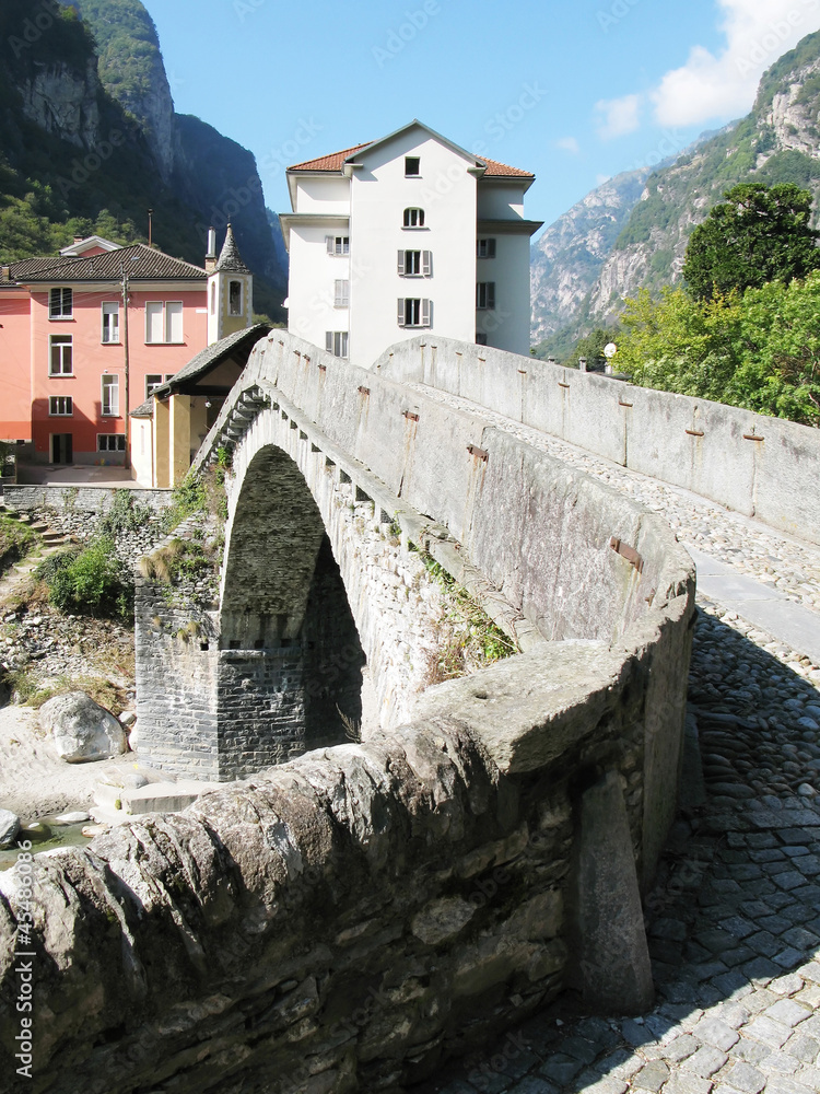 Ancient stone bridge in Bignasca, Southern Switzerland..