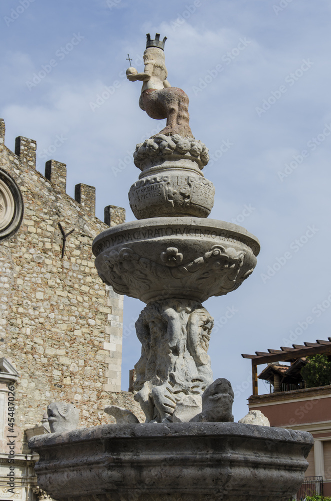 Fountain in front of Duomo di San Nicolo in Taormina, in Italy
