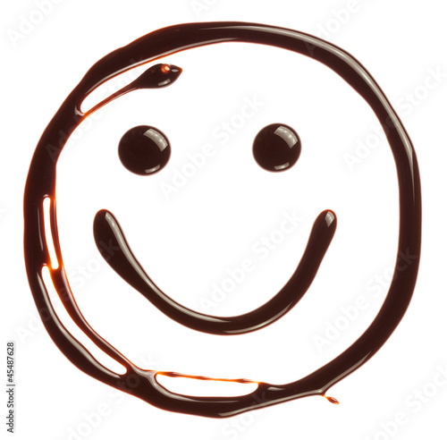 Smiley face made of chocolate syrup