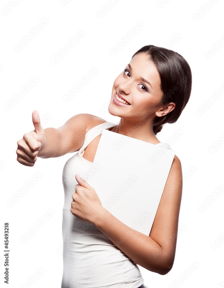 young smiiling casual brunette caucasian girl holding sign young smiiling casual brunette caucasian girl holding sign