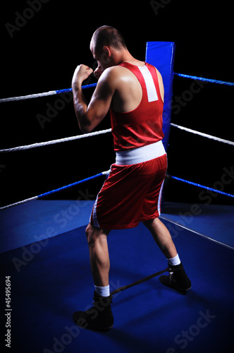 Male boxer in ring doing exercise © cirkoglu