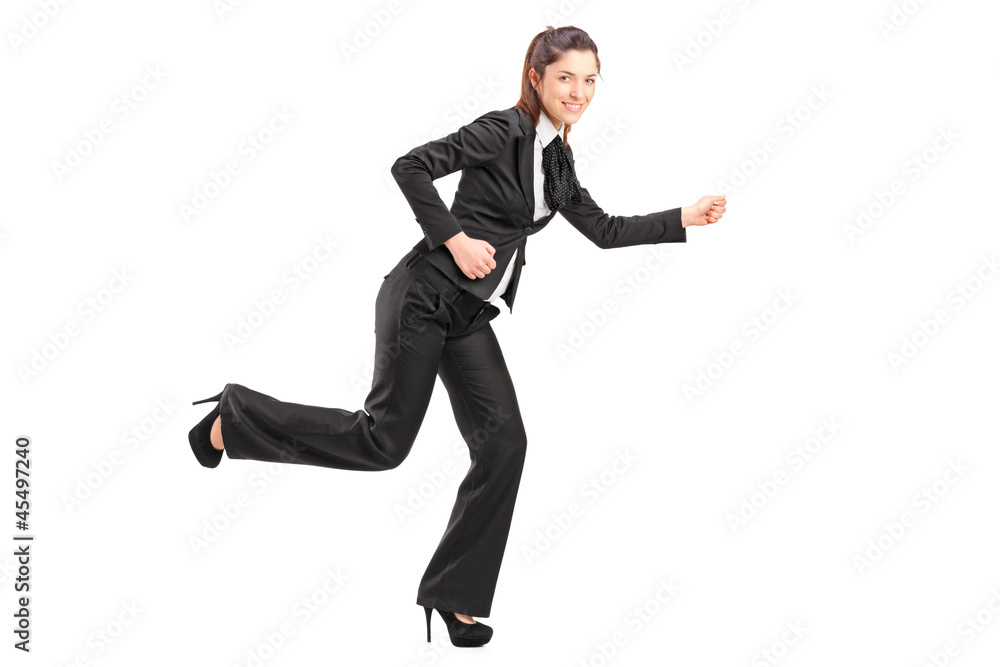 Full length portrait of a businesswoman running Full length portrait of a businesswoman running