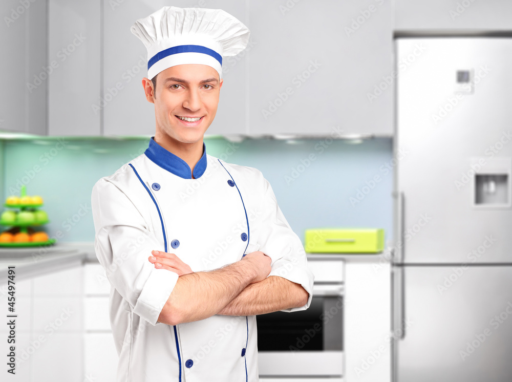 Male chef posing in a kitchen