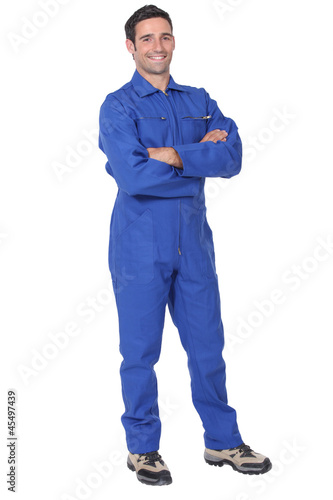 Full length worker in a boiler suit