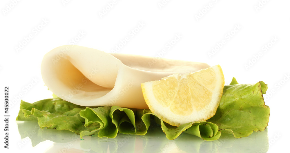 boiled squid with lettuce and lemon isolated on white boiled squid with lettuce and lemon isolated on white