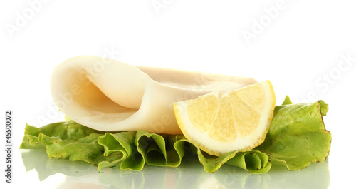 boiled squid with lettuce and lemon isolated on white
