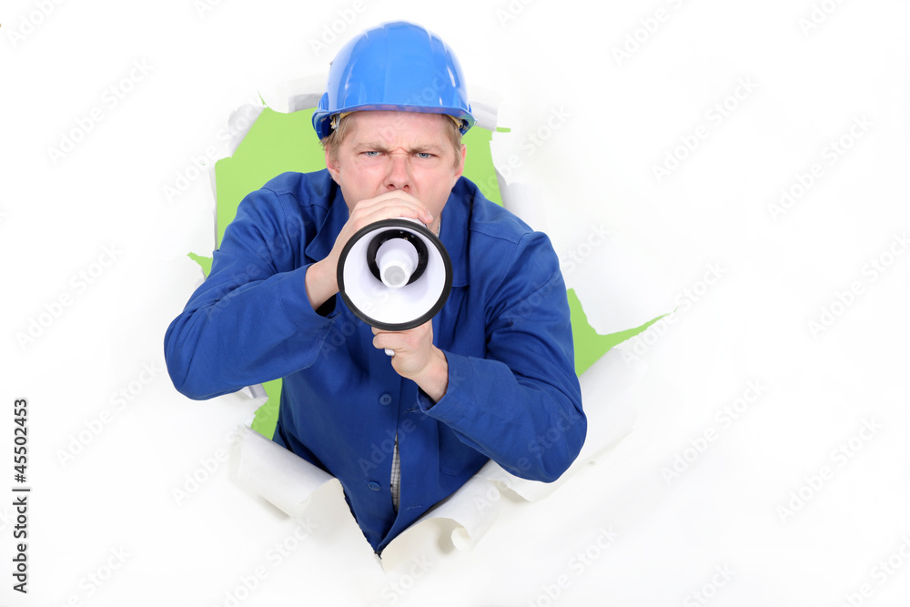 A manual worker with a megaphone.