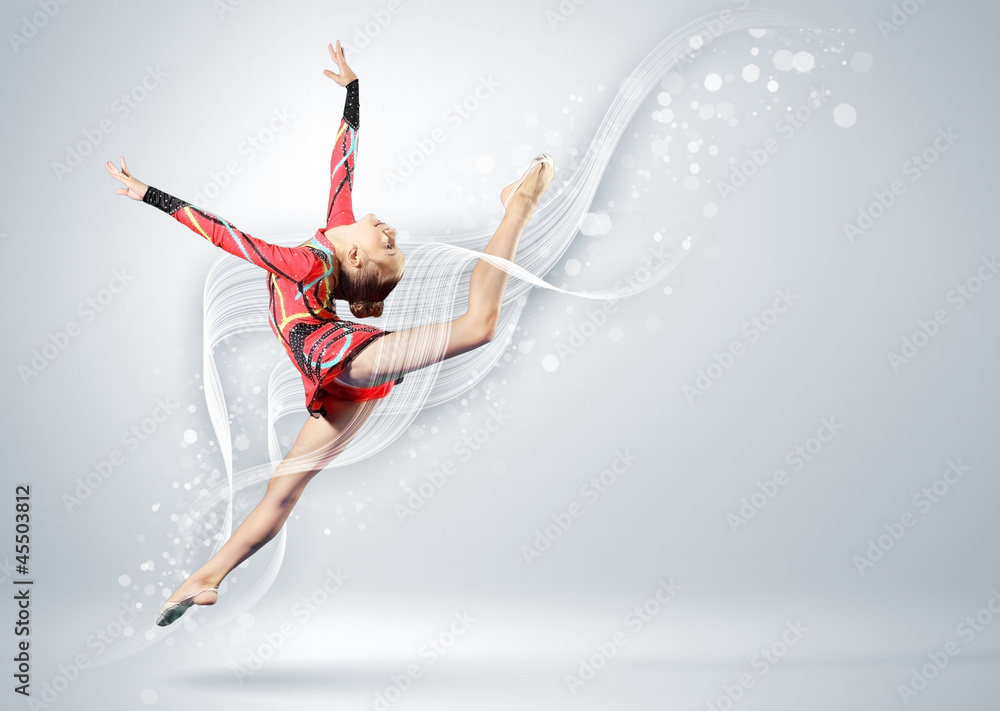 Fototapeta premium Young woman in gymnast suit posing