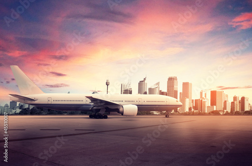 Obraz na płótnie Airplane and Big City
