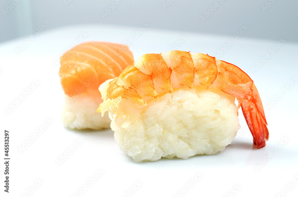 Nigiri Sushi with shrimp and salmon, on a plate Nigiri Sushi with shrimp and salmon, on a plate