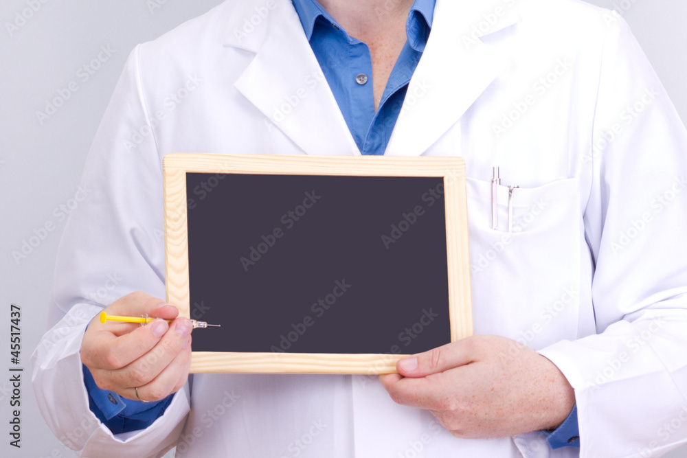 Doctor shows information on blackboard Doctor shows information on blackboard