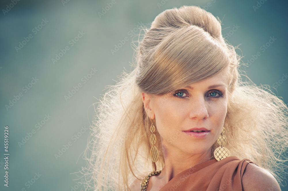 Young woman outdoors portrait. Young woman outdoors portrait.