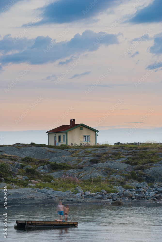 Isolated house on Swedish west coast taken near sumset