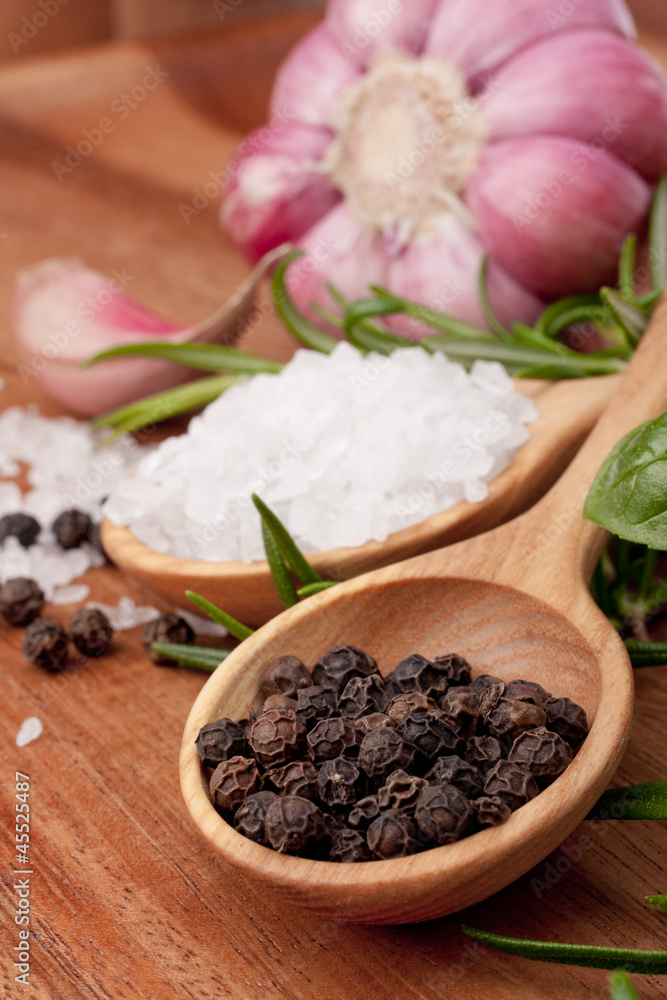 Fresh herbs and salt spoon Fresh herbs and salt spoon