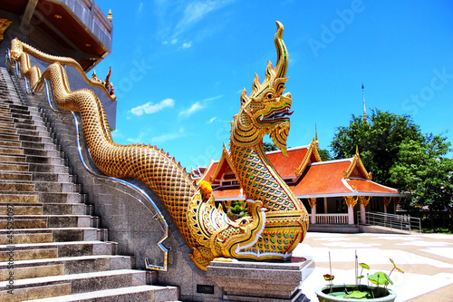 Thai Naka statue at pagoda © sombatkhamin