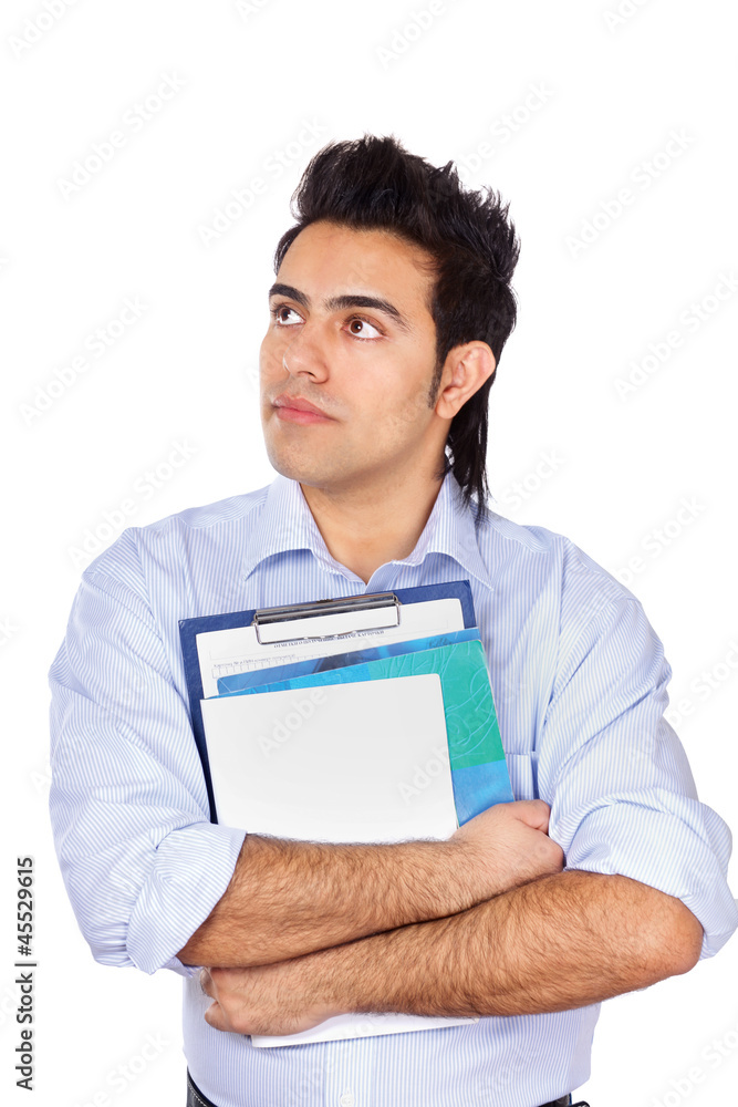 A young man with books, isolated on white background A young man with books, isolated on white background