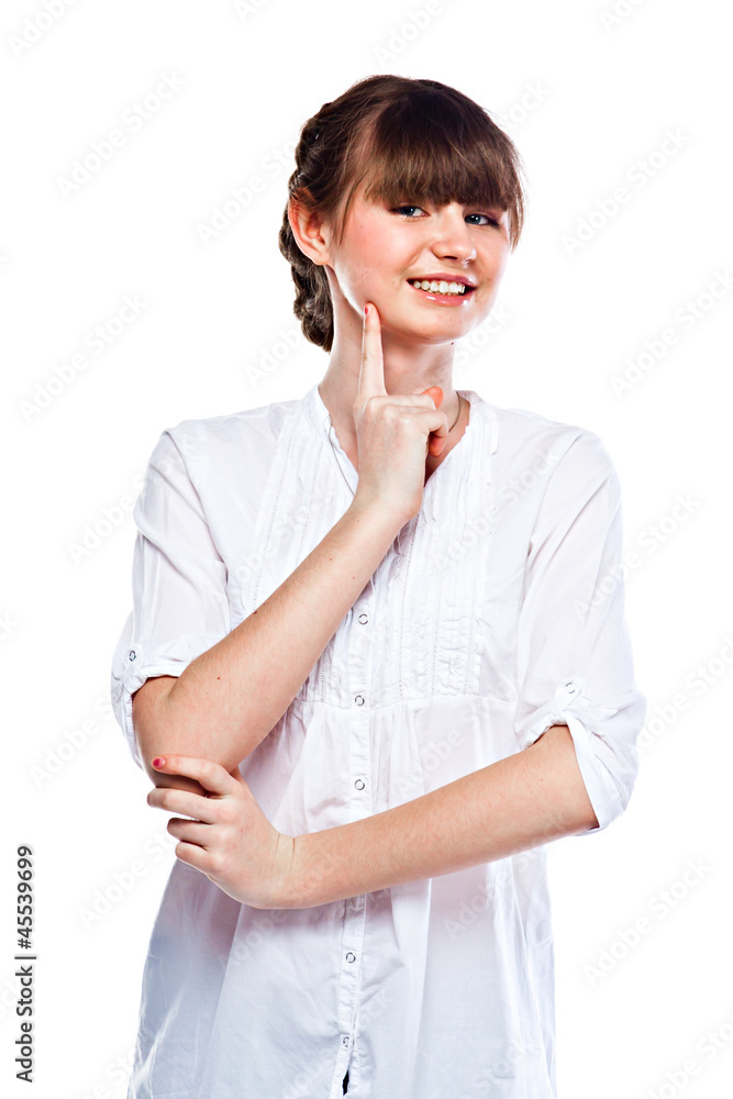 Young and funny girl in a white shirt and dark blue jeans Young and funny girl in a white shirt and dark blue jeans