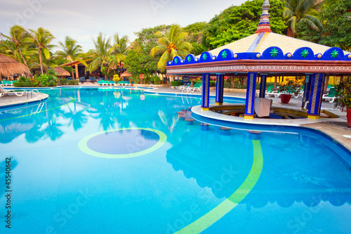 Morning at tropical swimming pool in Mexico © Patryk Kosmider
