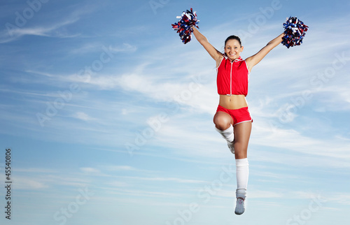 Young female cheerleader