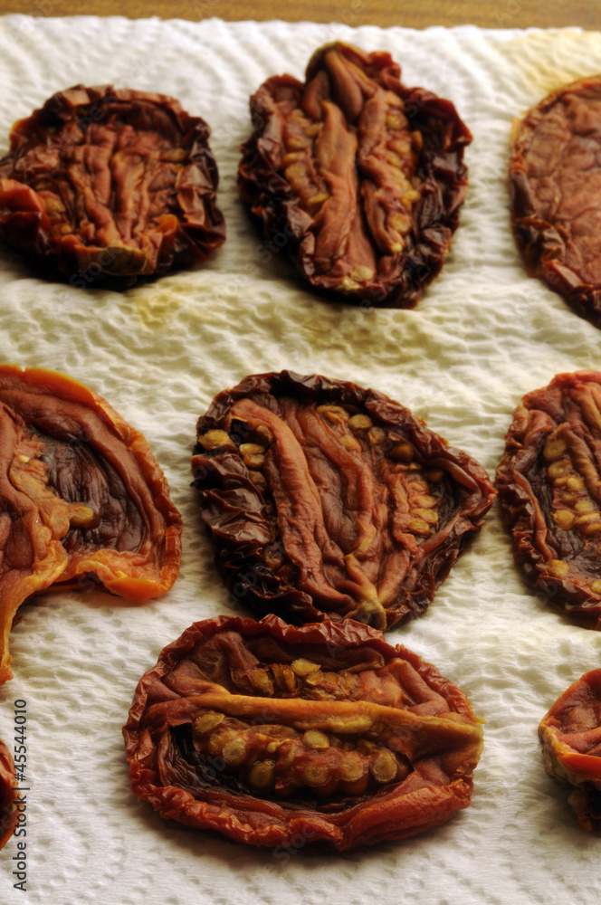 Obraz premium Dried tomatoes Tomates secos Pomodori secchi