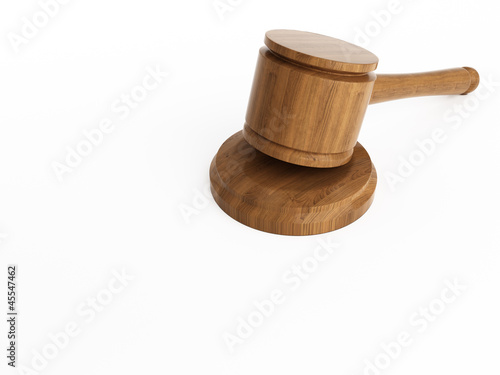 Varnished wooden gavel isolated on white photo