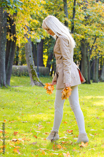 Beautiful woman walking in park